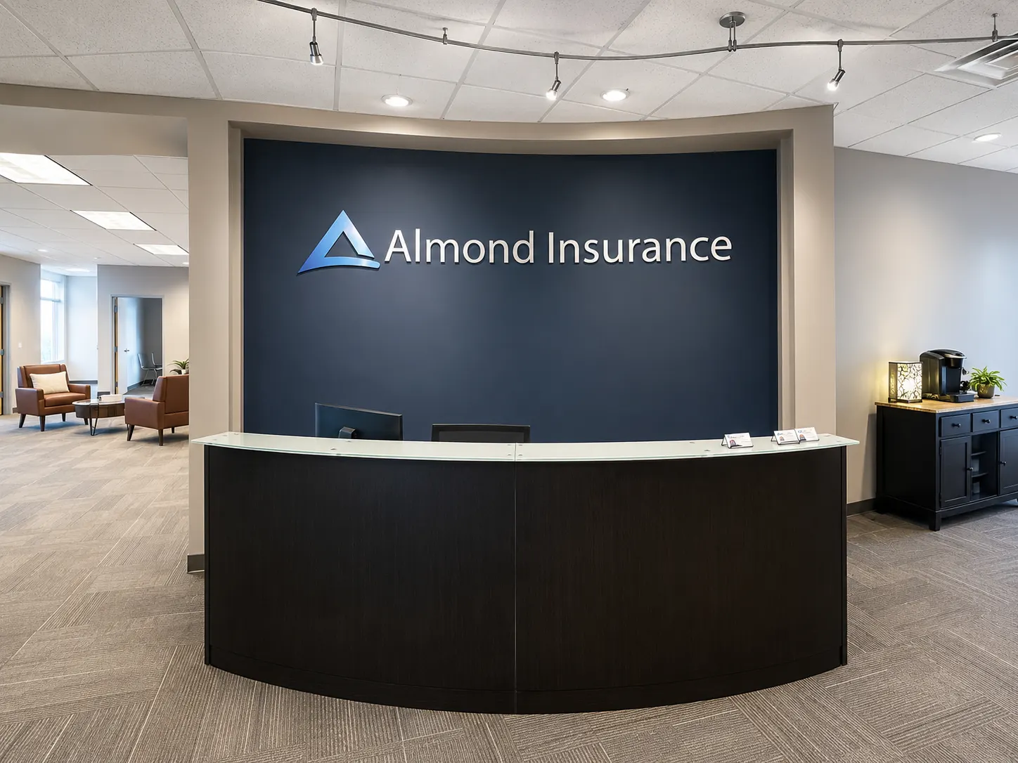 Front desk of the Almond Insurance office at 6870 Rote Rd Suite 101 in Rockford